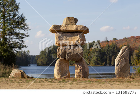 Inukshuk sculpture in Muskoka park, Canada. Inukshuk sculpture in Muskoka park, Canada. 131698772