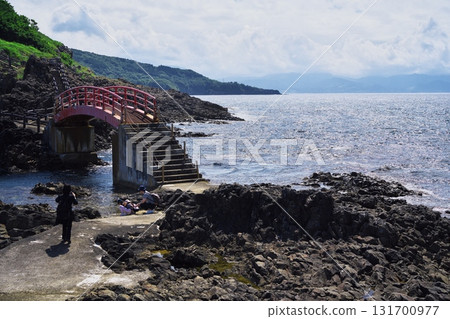 Tsugaru Peninsula in summer: The promenade and Shiosai Bridge stretching from Cape Takano to the sea Tsugaru Peninsula in summer: The promenade and Shiosai Bridge stretching from Cape Takano to the sea 131700977