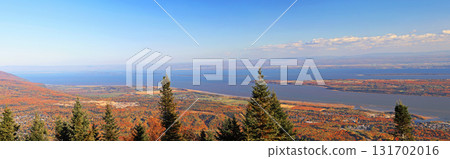 Aerial view over the St Lawrence River from Mont Sainte Anne in autumn, Quebec, Canada 131702016