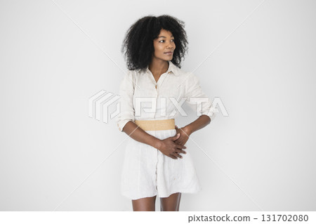 nice and cool Black American portrait female wearing suiton on white background 131702080