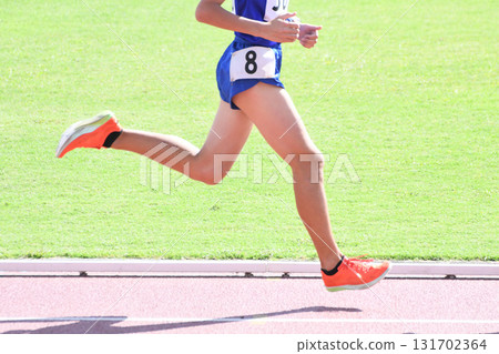 Runner running on the track Runner running on the track 131702364