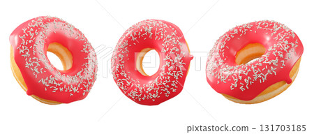 Donuts with red fruit glaze, sprinkles, white drizzle, and dots isolated on white transparent background 131703185