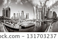 Panoramic view of Dubai Marina bay with yacht and cloudy sky, Dubai, UAE. 131703237