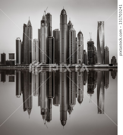 Skyscrapers and Urban city skyline over water, black and white style, city background, Dubai Marina bay UAE 131703241