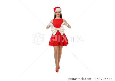Woman in red dress and Santa hat shows big bow, isolated, PNG 131703672