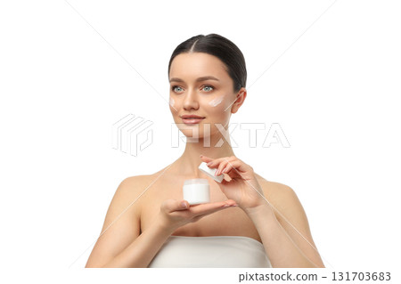 Skincare enthusiast uses cream while enjoying spa time, isolated, PNG 131703683