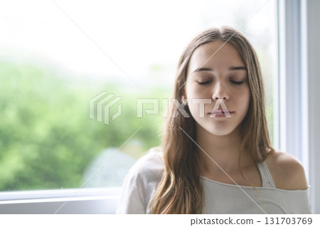 Depression in teenage concept, Young girl feeling anxious and unhappy. Depression in teenage concept, Young girl feeling anxious and unhappy. 131703769