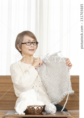 Senior women knitting 131703885