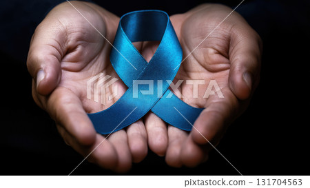 Hands hold a blue ribbon for diabetes awareness, created AI 131704563