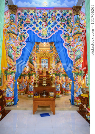Gilded altar with left eye as the main religious symbol in Khao Dai religion, unique to Vietnam Gilded altar with left eye as the main religious symbol in Khao Dai religion, unique to Vietnam 131706265