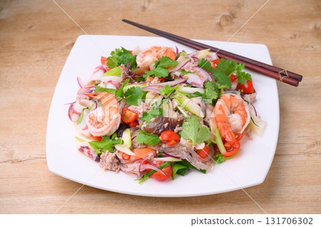 Thai and ethnic dishes include yam woon sen (homemade), and a salad of vermicelli, seafood, and coriander. Thai and ethnic dishes include yam woon sen (homemade), and a salad of vermicelli, seafood, and coriander. 131706302