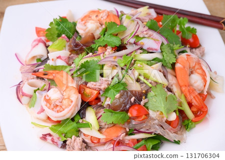 Thai and ethnic dishes include yam woon sen (homemade), and a salad of vermicelli, seafood, and coriander. 131706304