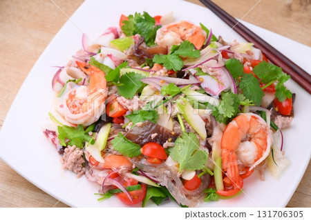 Thai and ethnic dishes include yam woon sen (homemade), and a salad of vermicelli, seafood, and coriander. 131706305