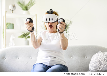 nice senior woman play virtual reality game 131706617