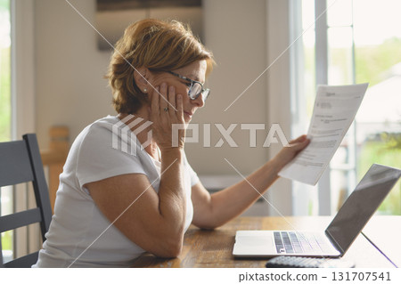 Sad frustrated senior woman pensioner having depressed look 131707541