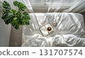 Bright bedroom interior with morning light streaming in (Natural Bedroom Series) 131707574