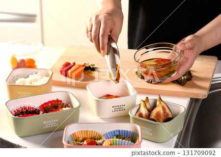 A scene of a lunch box packed with colorful side dishes, designed in Scandinavian style 131709092