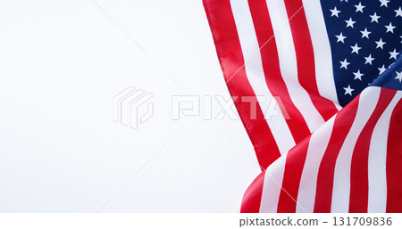 United States flag on white background with copy space, suitable for patriotic posters, banners, and national celebration designs. 131709836