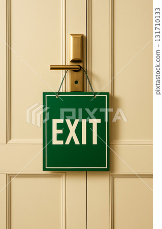 Exit sign on brass door handle in hotel interior Exit sign on brass door handle in hotel interior 131710133