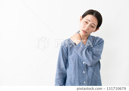 Woman wearing pajamas Lifestyle image Woman wearing pajamas Lifestyle image 131710679