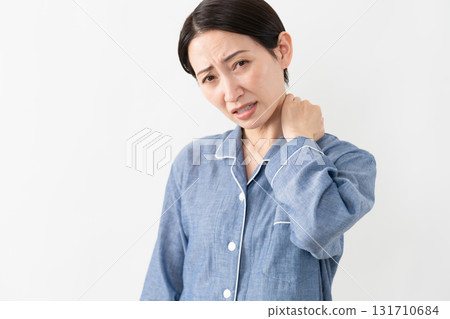 Woman wearing pajamas Lifestyle image Woman wearing pajamas Lifestyle image 131710684