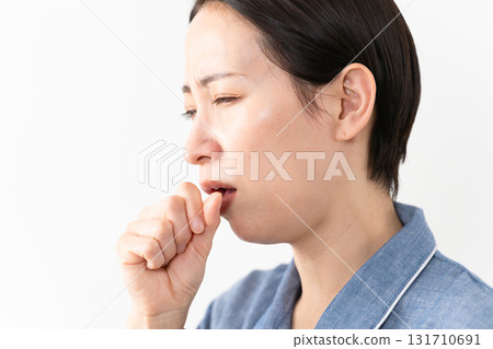 Woman wearing pajamas Lifestyle image Woman wearing pajamas Lifestyle image 131710691