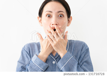 Woman wearing pajamas Lifestyle image Woman wearing pajamas Lifestyle image 131710728