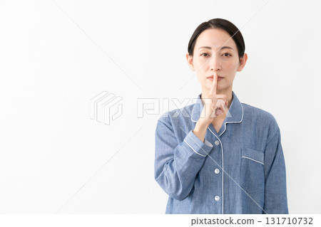 Woman wearing pajamas Lifestyle image Woman wearing pajamas Lifestyle image 131710732