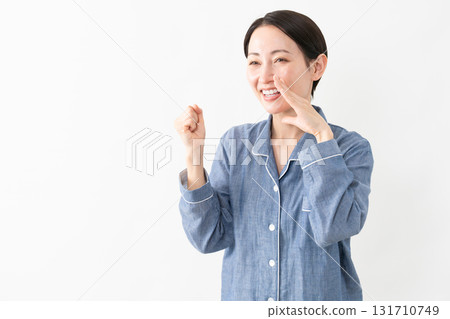 Woman wearing pajamas Lifestyle image 131710749