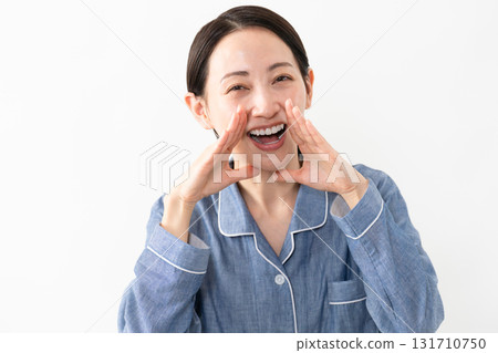 Woman wearing pajamas Lifestyle image 131710750