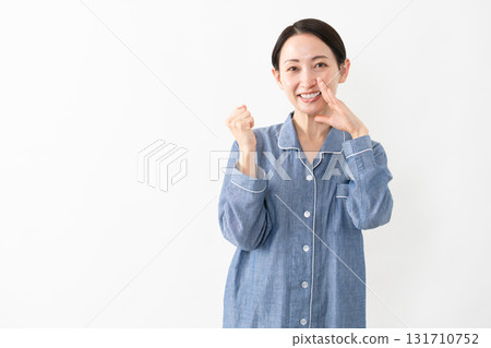 Woman wearing pajamas Lifestyle image Woman wearing pajamas Lifestyle image 131710752