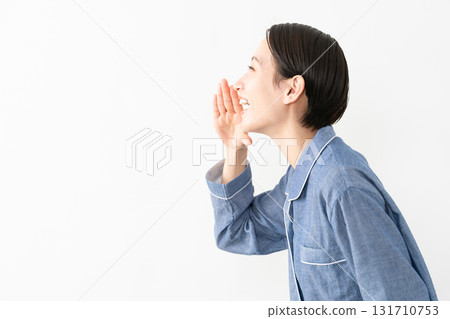 Woman wearing pajamas Lifestyle image Woman wearing pajamas Lifestyle image 131710753