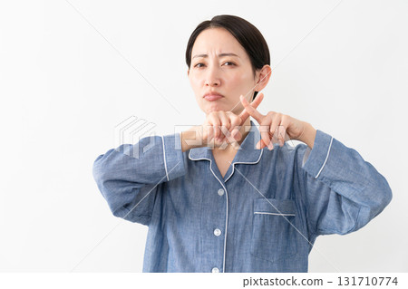 Woman wearing pajamas Lifestyle image Woman wearing pajamas Lifestyle image 131710774