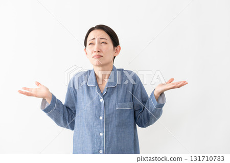 Woman wearing pajamas Lifestyle image 131710783