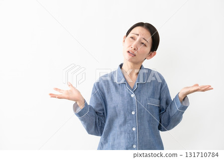 Woman wearing pajamas Lifestyle image 131710784