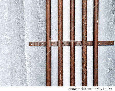 Rusted metal bars on Concrete Wall Background. 131712233