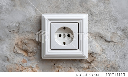 Electrical outlet installed on textured wall with vintage design elements 131713115