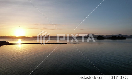 The sunrise seen from the pier in Akasaki, Higashihiroshima City 131713872