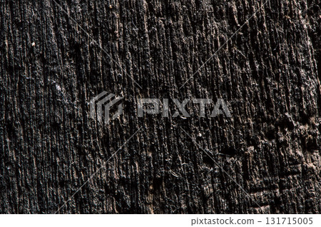 The wood texture in dark shades looks deep and rich 131715005
