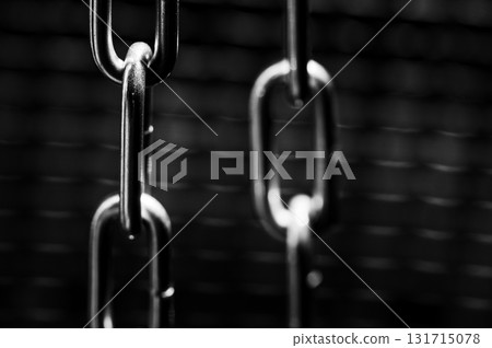 Thick steel chains look heavy 131715078