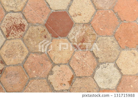 Hexagonal vintage beige tile in a french old manor Hexagonal vintage beige tile in a french old manor 131715988