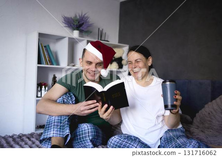 a senior woman and young man read the Bible together, celebrate Christmas, online church a senior woman and young man read the Bible together, celebrate Christmas, online church 131716062