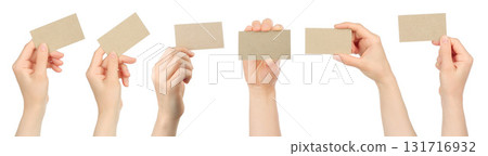 Set of human hand holding craft business card isolated on transparent background Set of human hand holding craft business card isolated on transparent background 131716932