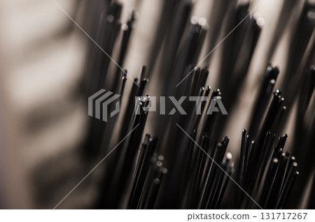 The steel brush is filmed in detail with an emphasis on the bristles 131717267