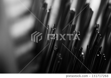 The steel brush is filmed in detail with an emphasis on the bristles 131717268