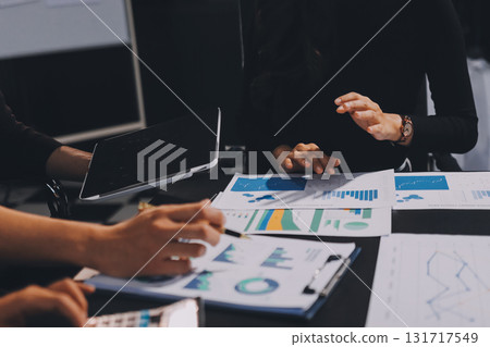 Accounting company provide finance and taxation planning for profitable cash flow, Auditor and accountant team working in office, analyze financial data and accounting record with calculator.Insight Accounting company provide finance and taxation planning for profitable cash flow, Auditor and accountant team working in office, analyze financial data and accounting record with calculator.Insight 131717549