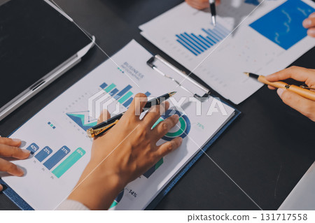 Accounting company provide finance and taxation planning for profitable cash flow, Auditor and accountant team working in office, analyze financial data and accounting record with calculator.Insight Accounting company provide finance and taxation planning for profitable cash flow, Auditor and accountant team working in office, analyze financial data and accounting record with calculator.Insight 131717558