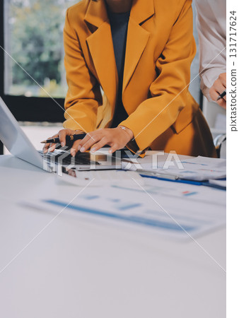 Accounting company provide finance and taxation planning for profitable cash flow, Auditor and accountant team working in office, analyze financial data and accounting record with calculator.Insight Accounting company provide finance and taxation planning for profitable cash flow, Auditor and accountant team working in office, analyze financial data and accounting record with calculator.Insight 131717624
