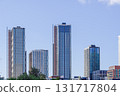 Modern skyscrapers rise over Canary Wharf in East London, United Kingdom. 131717804