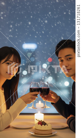 A couple enjoying dinner at a window seat in a restaurant, gazing at the snowy scenery. A couple enjoying dinner at a window seat in a restaurant, gazing at the snowy scenery. 131718261